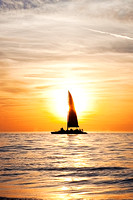 Sailboat Sunset Beach and Ocean Photo Print by Marisa Balletti-Lavoie